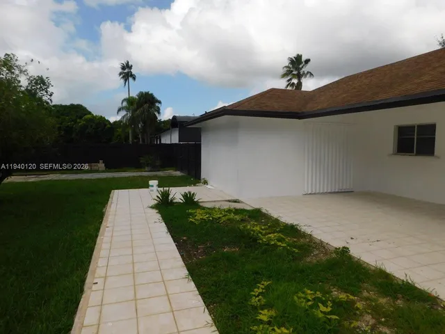 a view of outdoor space and yard