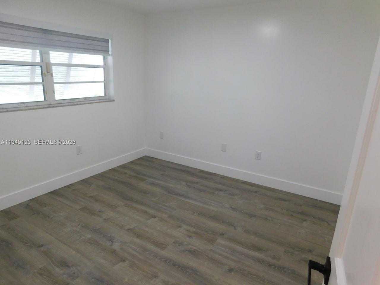 16240 Southwest 286th Street Homestead, FL 33033 - Photo 20 of 25 an empty room with a window