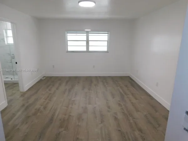 an empty room with a window