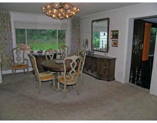 26 Nancy Road Newton, MA 02467 - Photo 5 of 11 a dining room with furniture and a floor to ceiling window