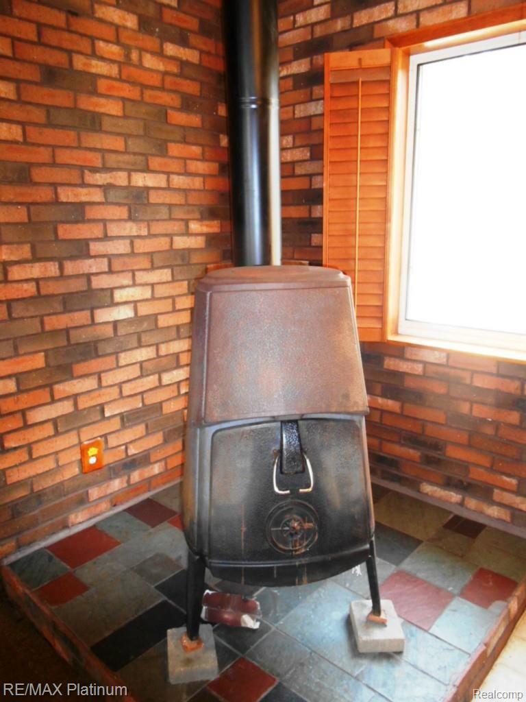 1840 Gray Road Howell, MI 48843 - Photo 8 of 35 Wood Burner