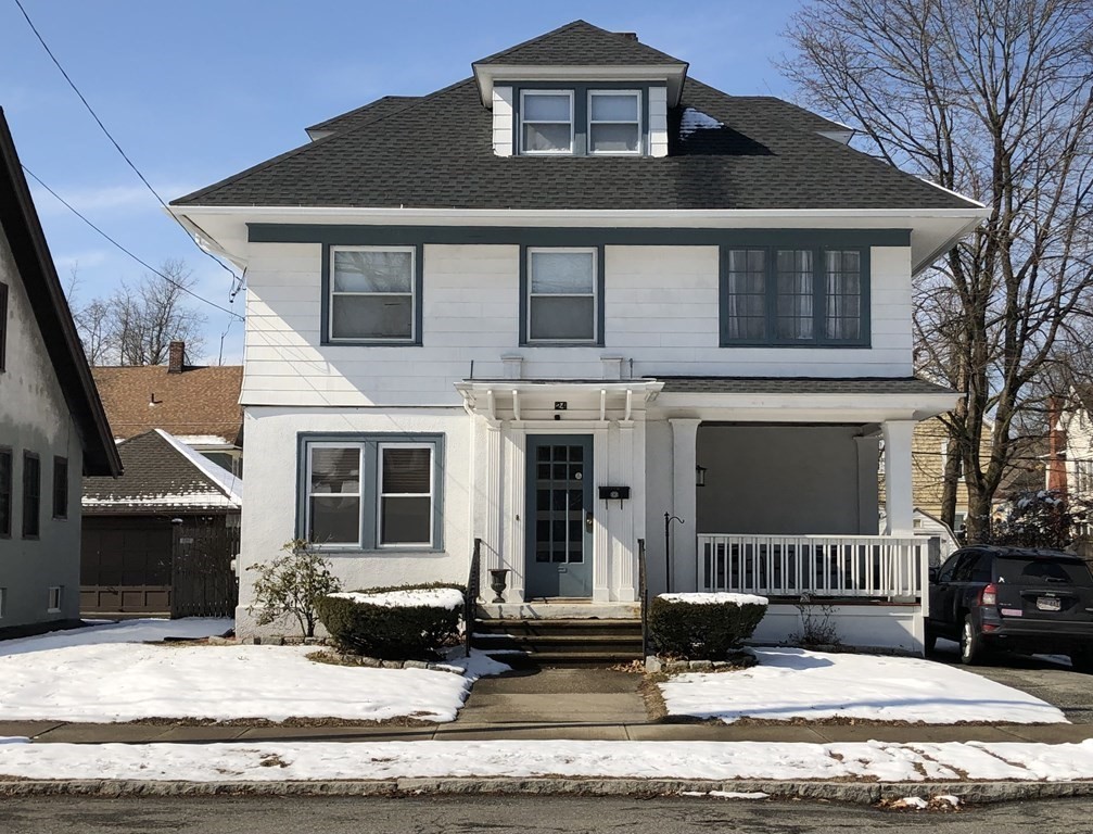 24 Daviston Street Springfield, MA 01108 - Photo 1 of 38 a front view of a house with a yard