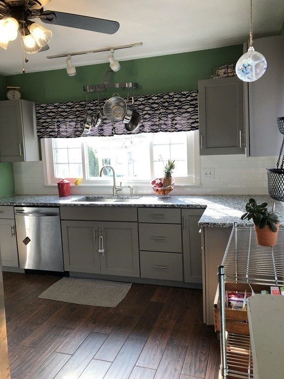 24 Daviston Street Springfield, MA 01108 - Photo 12 of 38 a kitchen with a sink cabinets and window