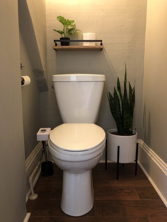 24 Daviston Street Springfield, MA 01108 - Photo 14 of 38 a white toilet sitting next to a white house