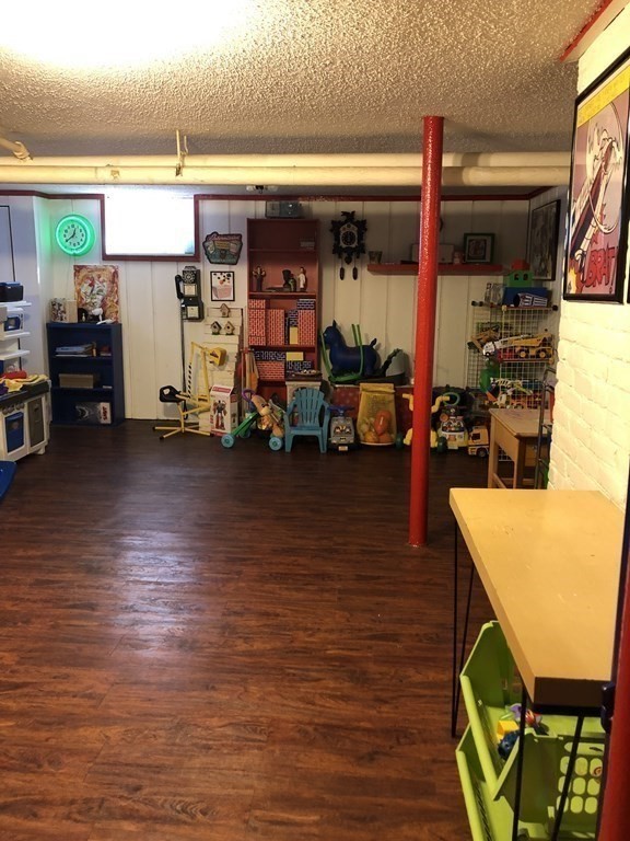 24 Daviston Street Springfield, MA 01108 - Photo 31 of 38 a view of a children room with furniture and toys