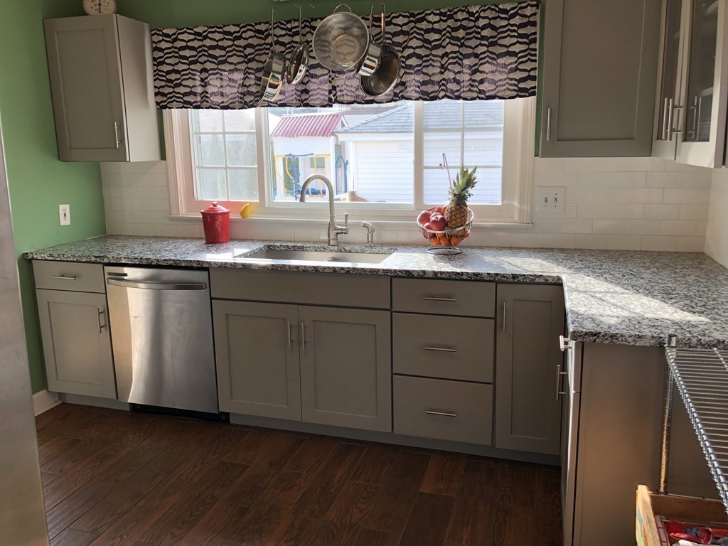 24 Daviston Street Springfield, MA 01108 - Photo 10 of 38 a kitchen with sink and cabinets