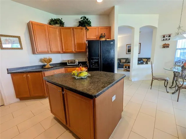 a living room with furniture rug and window