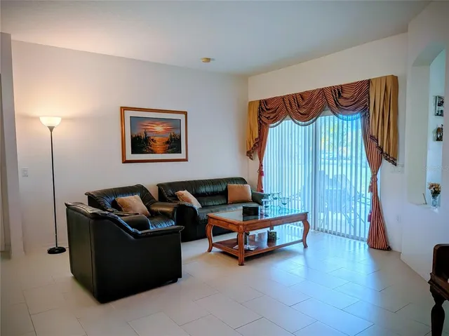 a bed room with furniture and a couch