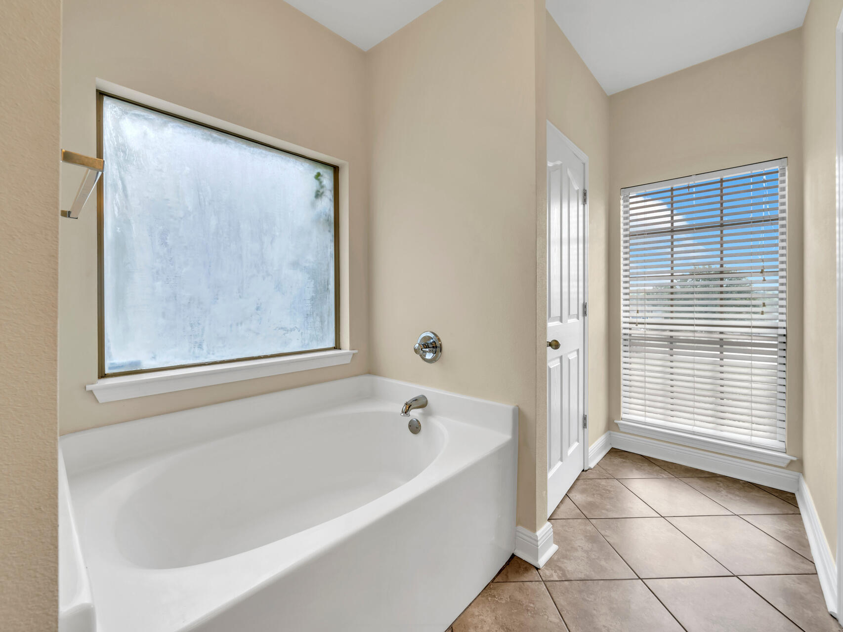 612 Rowan Circle Crestview, FL 32536 - Photo 20 of 32 a bathroom with a bathtub and shower