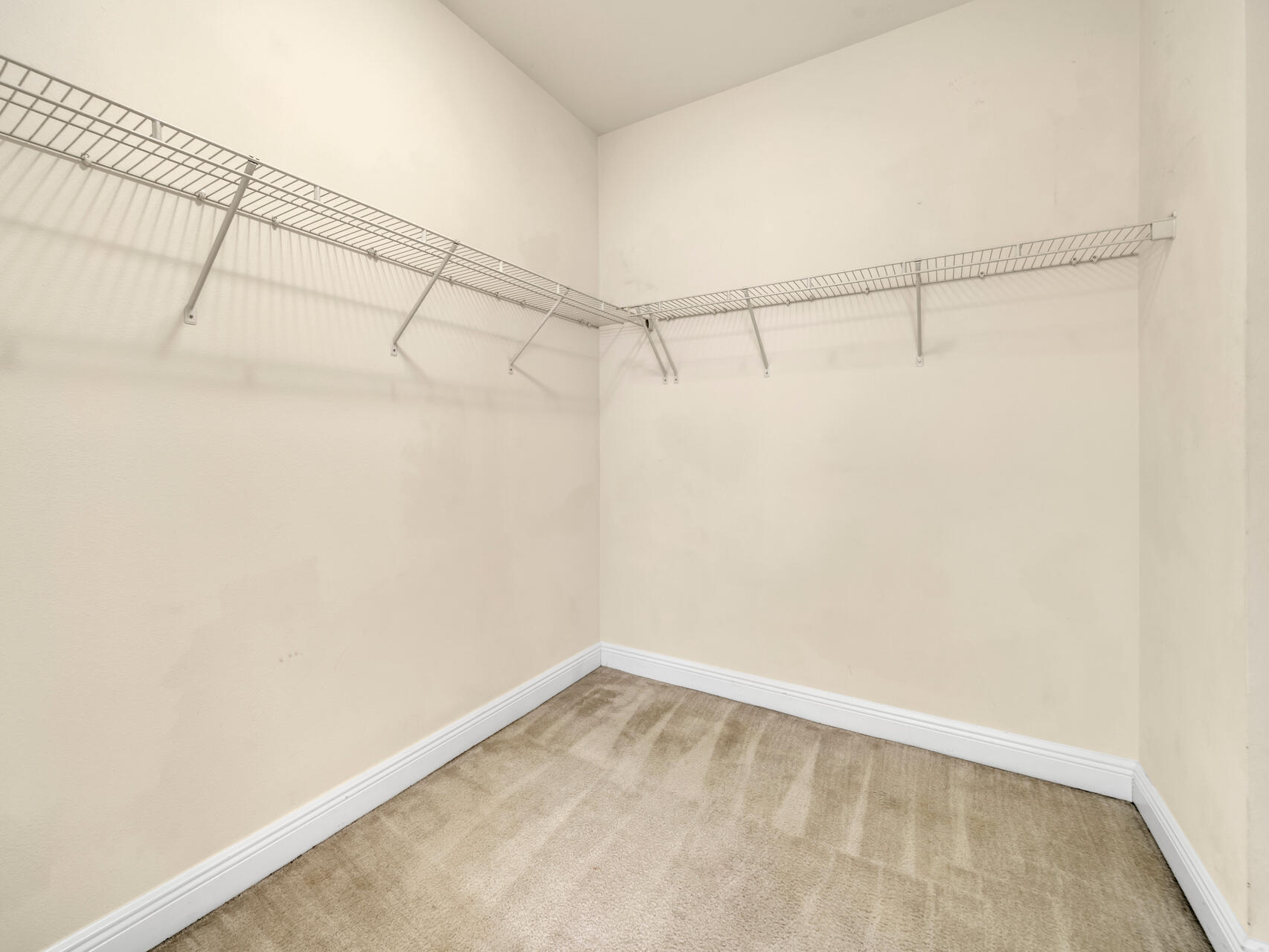 612 Rowan Circle Crestview, FL 32536 - Photo 21 of 32 a view of a room with racks on the wall