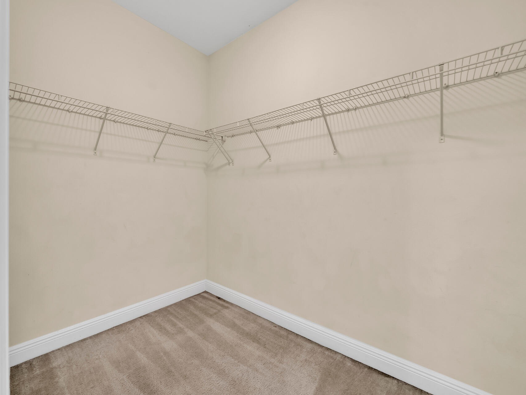 612 Rowan Circle Crestview, FL 32536 - Photo 25 of 32 a view of a room with racks on the wall