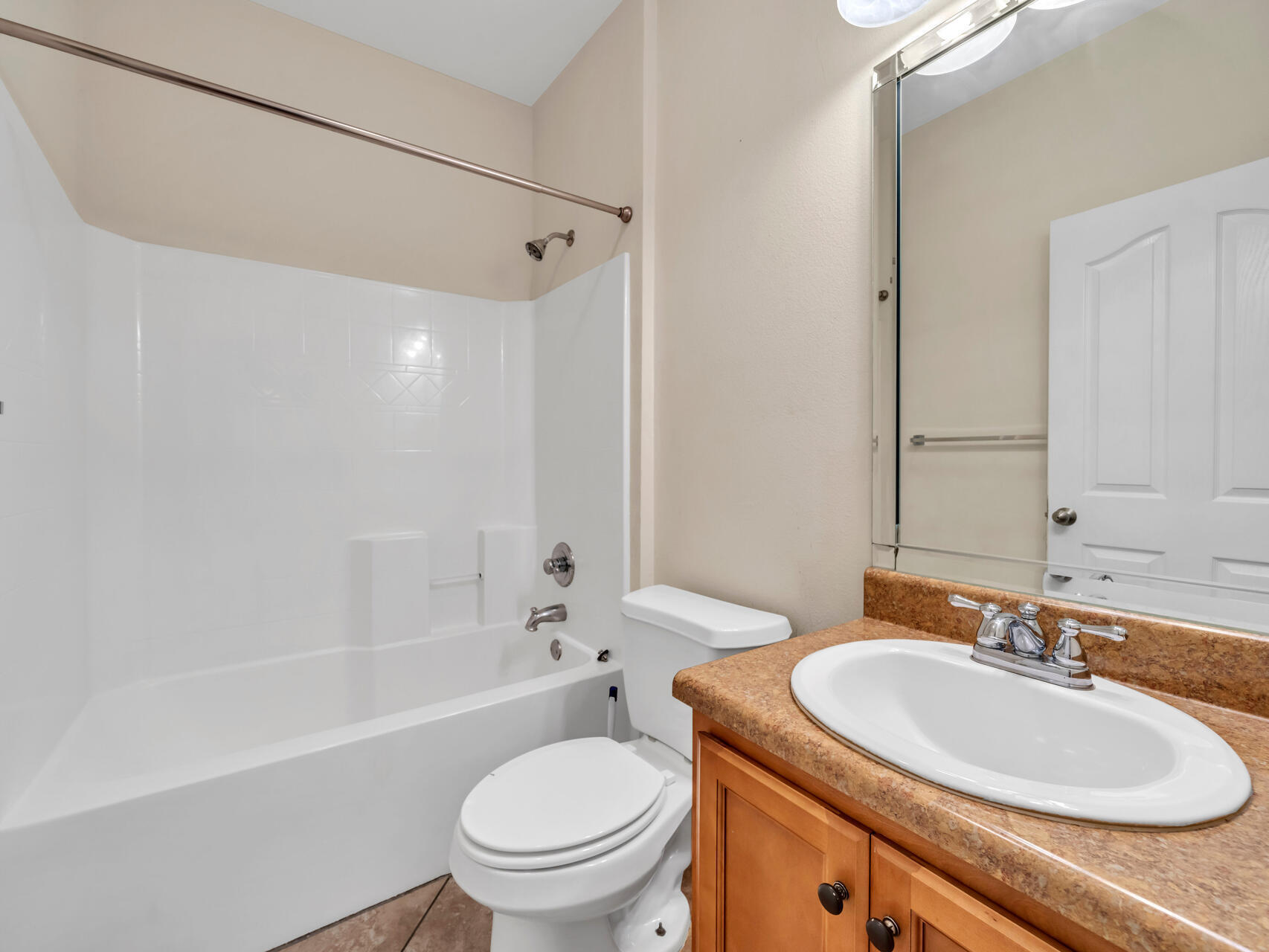 612 Rowan Circle Crestview, FL 32536 - Photo 26 of 32 a bathroom with a sink toilet and shower