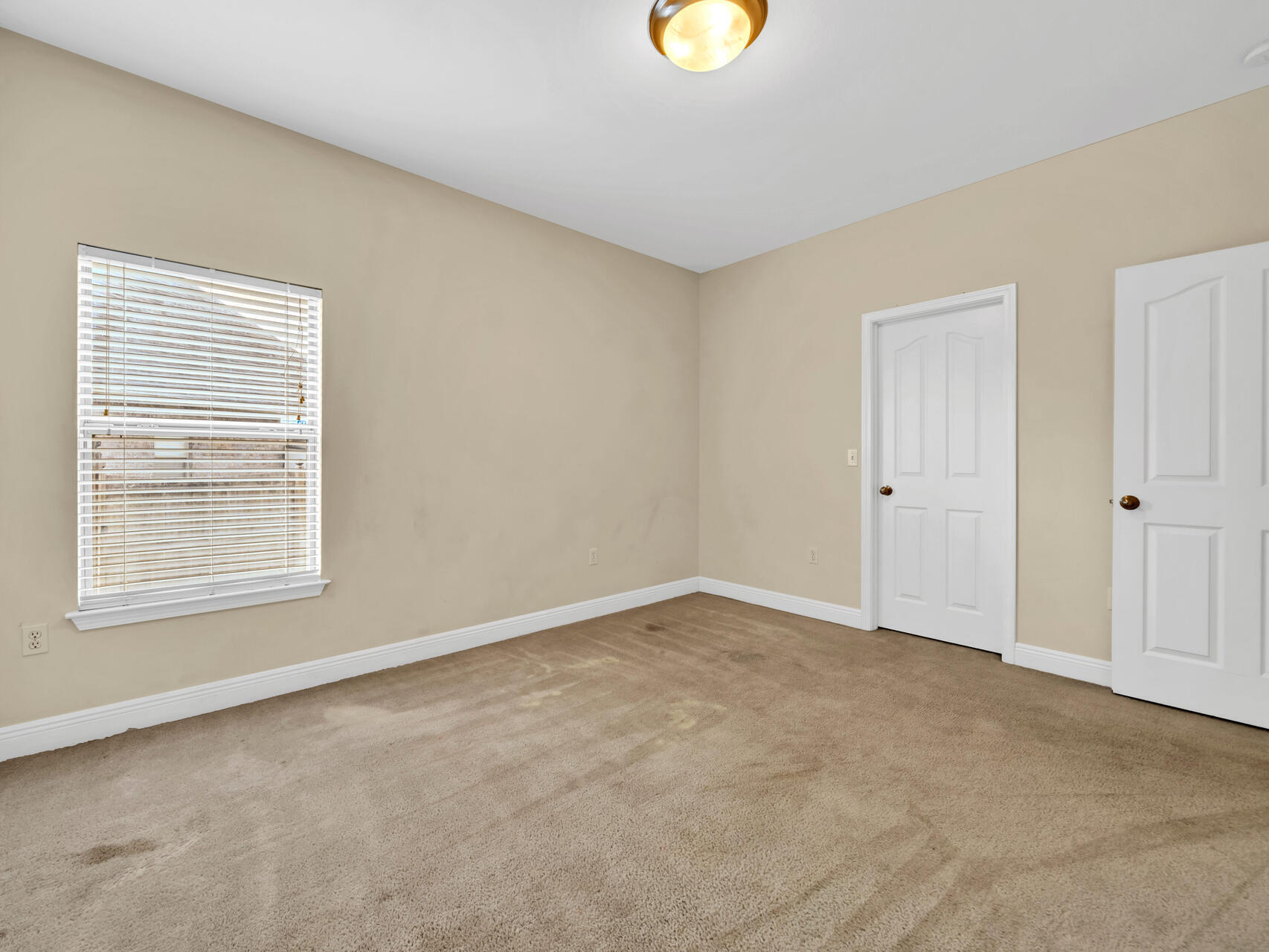 612 Rowan Circle Crestview, FL 32536 - Photo 28 of 32 an empty room with windows