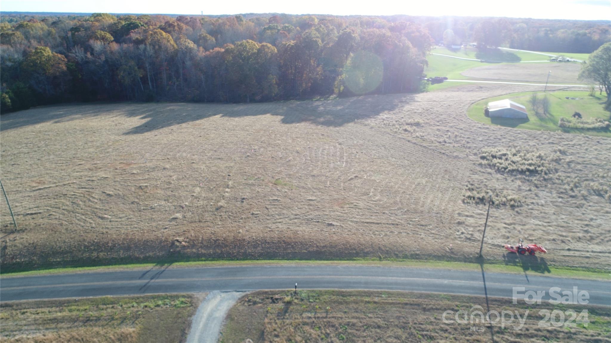 Lot 2 Belt Road Midland, NC 28107 - Photo 2 of 7 a view of a dry yard with wooden fence