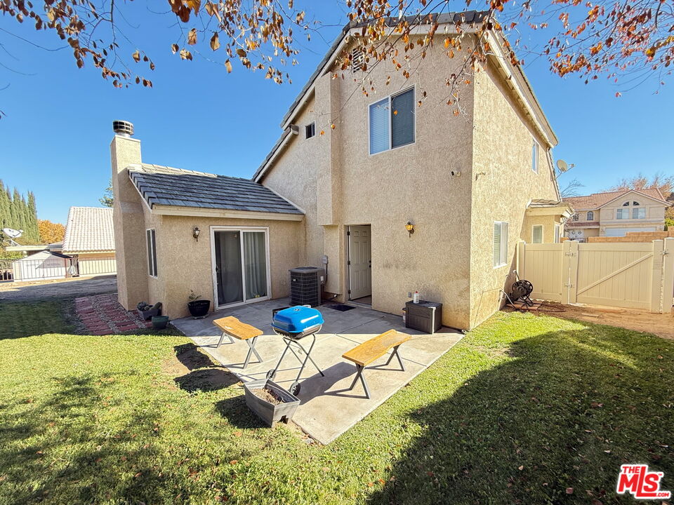 18238 Kalin Ranch Drive Victorville, CA 92395 - Photo 3 of 33 a view of a house with backyard and sitting area