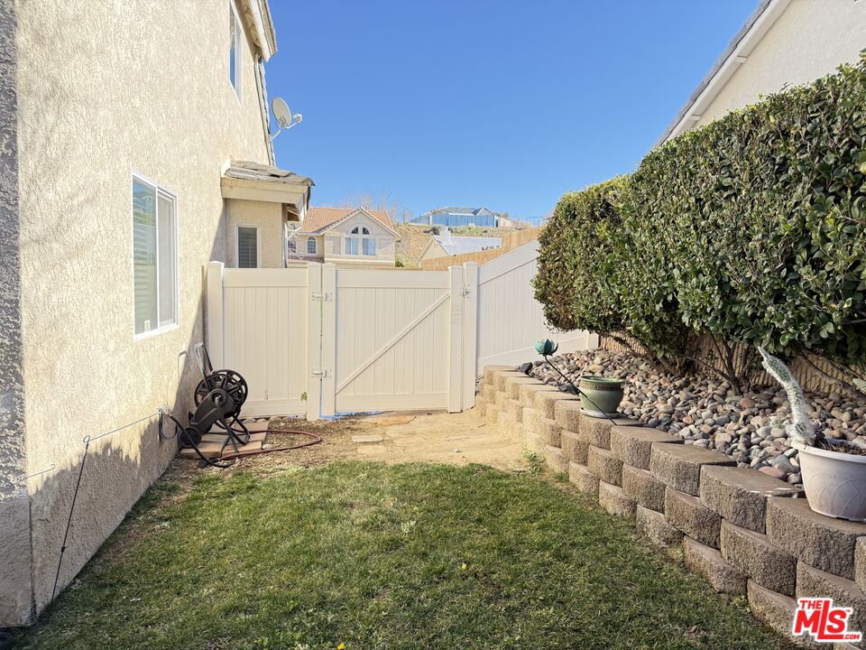 18238 Kalin Ranch Drive Victorville, CA 92395 - Photo 32 of 33 a view of a backyard