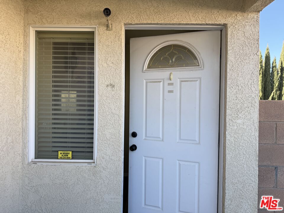 18238 Kalin Ranch Drive Victorville, CA 92395 - Photo 4 of 33 a view of entryway with a hallway