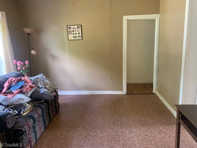 562 Garrett Road Eden, NC 27288 - Photo 14 of 21 den between kitchen and living room