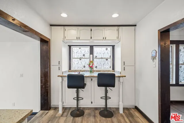 a view of kitchen with breakfast area