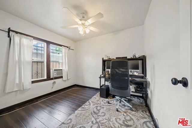 a workspace with furniture and a window