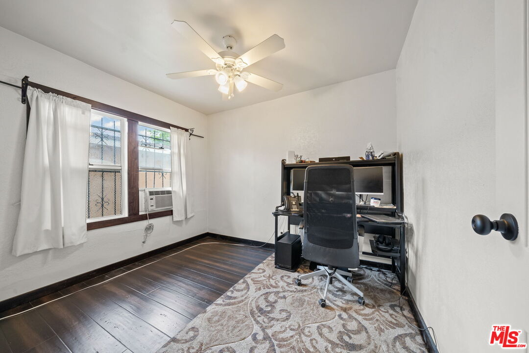 5732 6th Avenue Los Angeles, CA 90043 - Photo 15 of 22 a workspace with furniture and a window