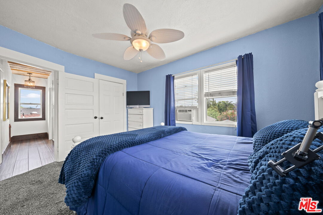 5732 6th Avenue Los Angeles, CA 90043 - Photo 22 of 22 a bedroom with a large bed and a window