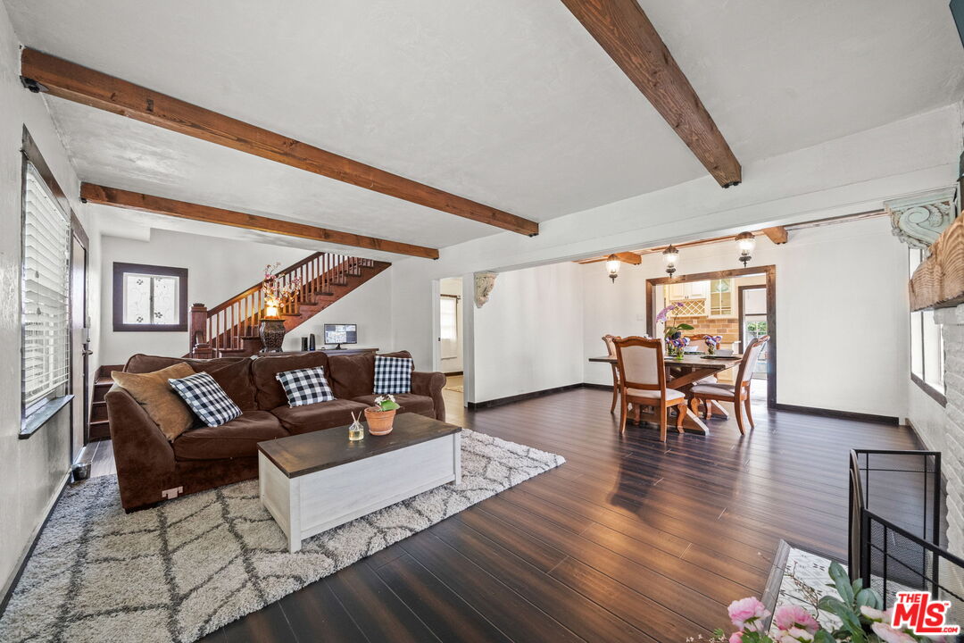 5732 6th Avenue Los Angeles, CA 90043 - Photo 7 of 22 a living room with furniture and wooden floor