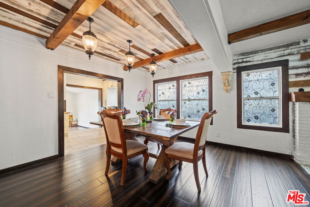 5732 6th Avenue Los Angeles, CA 90043 - Photo 8 of 22 a view of a dining room with furniture window and wooden floor