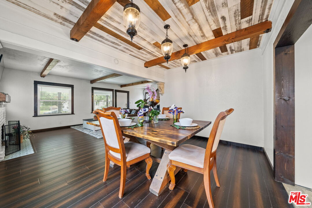 5732 6th Avenue Los Angeles, CA 90043 - Photo 9 of 22 a view of a dining room with furniture and wooden floor