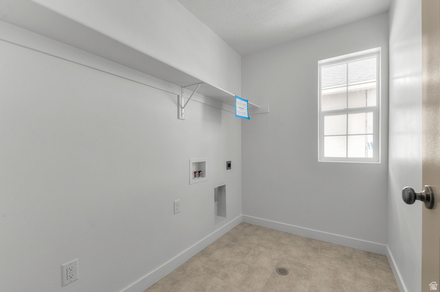 7797 West Alta Springs Way Magna, UT 84044 - Photo 20 of 21 Laundry room with electric dryer hookup and hookup for a washing machine