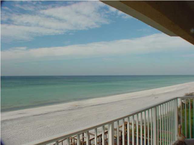 6015 Highway Santa Rosa Beach, Unit A201 30A Santa Rosa Beach, FL 32459 - Photo 12 of 24 a balcony with a yard