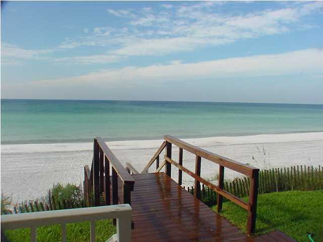 6015 Highway Santa Rosa Beach, Unit A201 30A Santa Rosa Beach, FL 32459 - Photo 17 of 24 a view of a terrace with yard and lake view