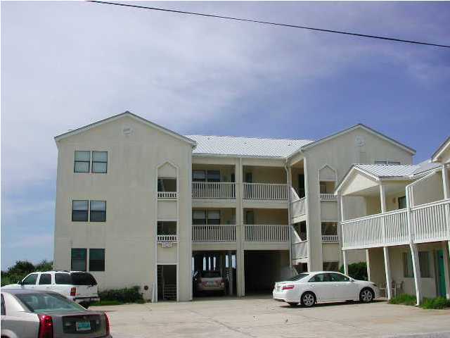 6015 Highway Santa Rosa Beach, Unit A201 30A Santa Rosa Beach, FL 32459 - Photo 18 of 24 a car parked in front of a building
