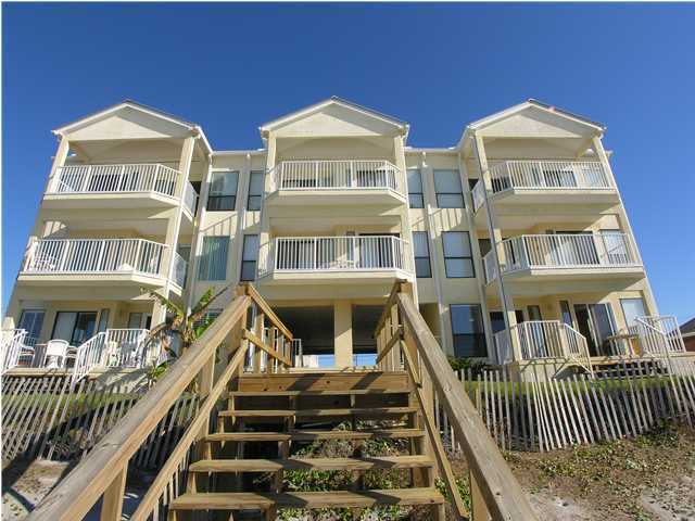 6015 Highway Santa Rosa Beach, Unit A201 30A Santa Rosa Beach, FL 32459 - Photo 23 of 24 a view of a brick building with many windows