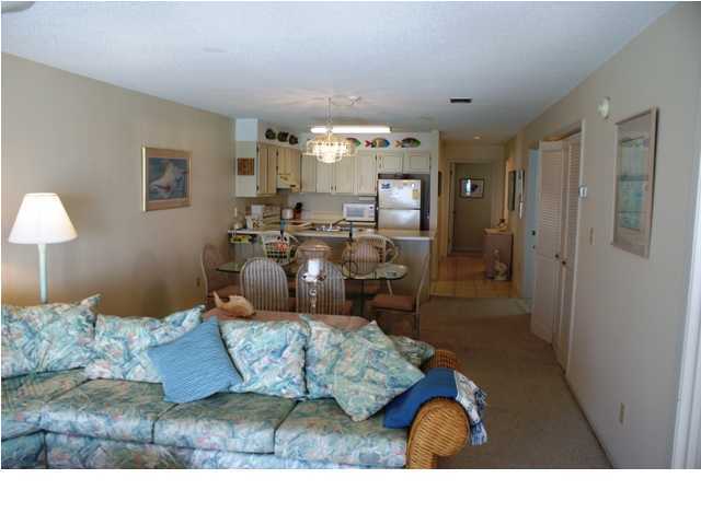 6015 Highway Santa Rosa Beach, Unit A201 30A Santa Rosa Beach, FL 32459 - Photo 6 of 24 a living room with furniture and a wooden floor