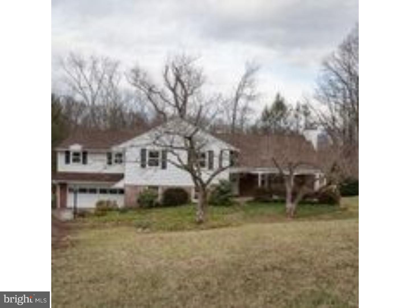 165 Ridgefield Road Newtown Square, PA 19073 - Photo 1 of 19 a view of a house with a yard