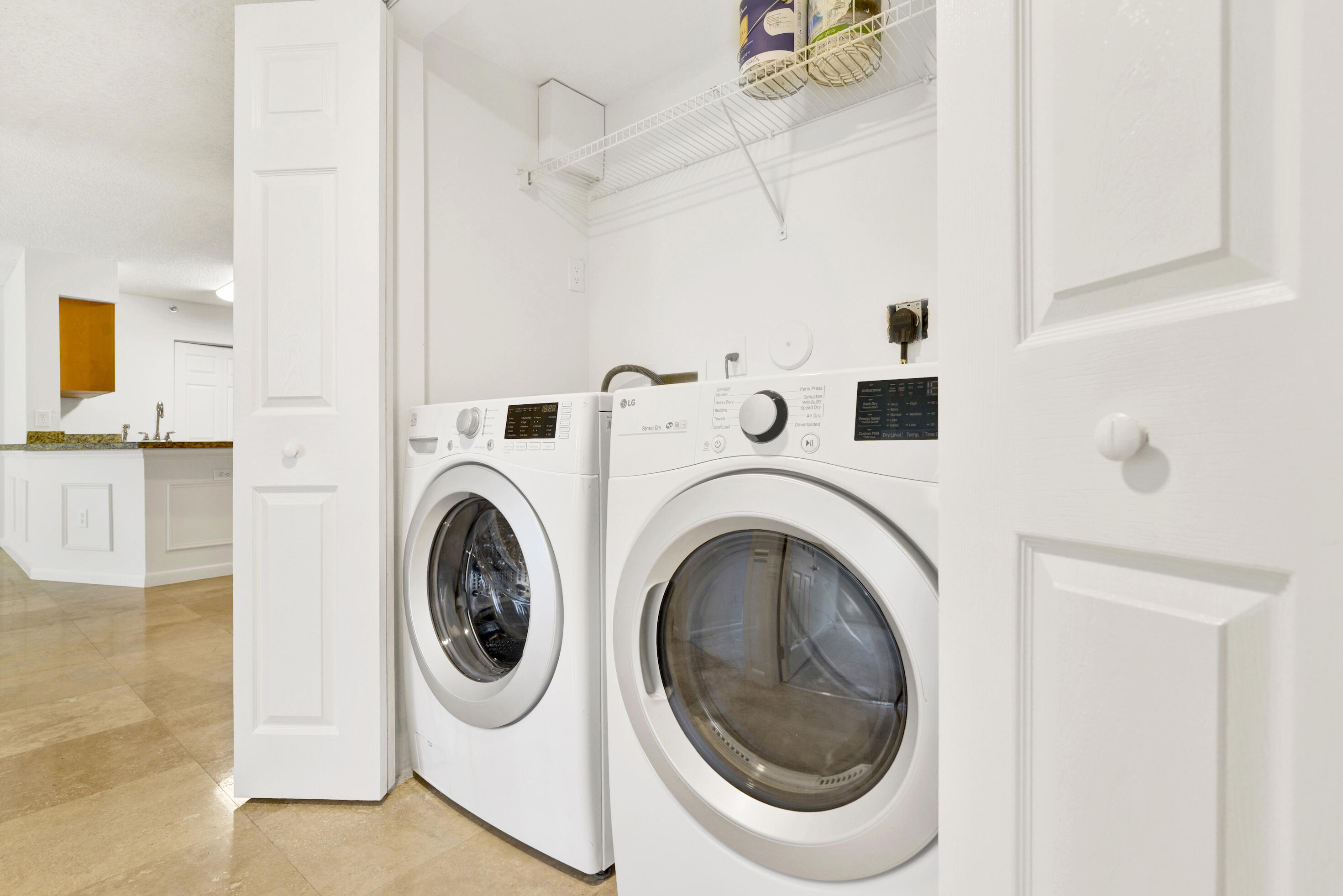 3143 Clint Moore Road, Unit 105 Boca Raton, FL 33496 - Photo 24 of 49 Laundry closet