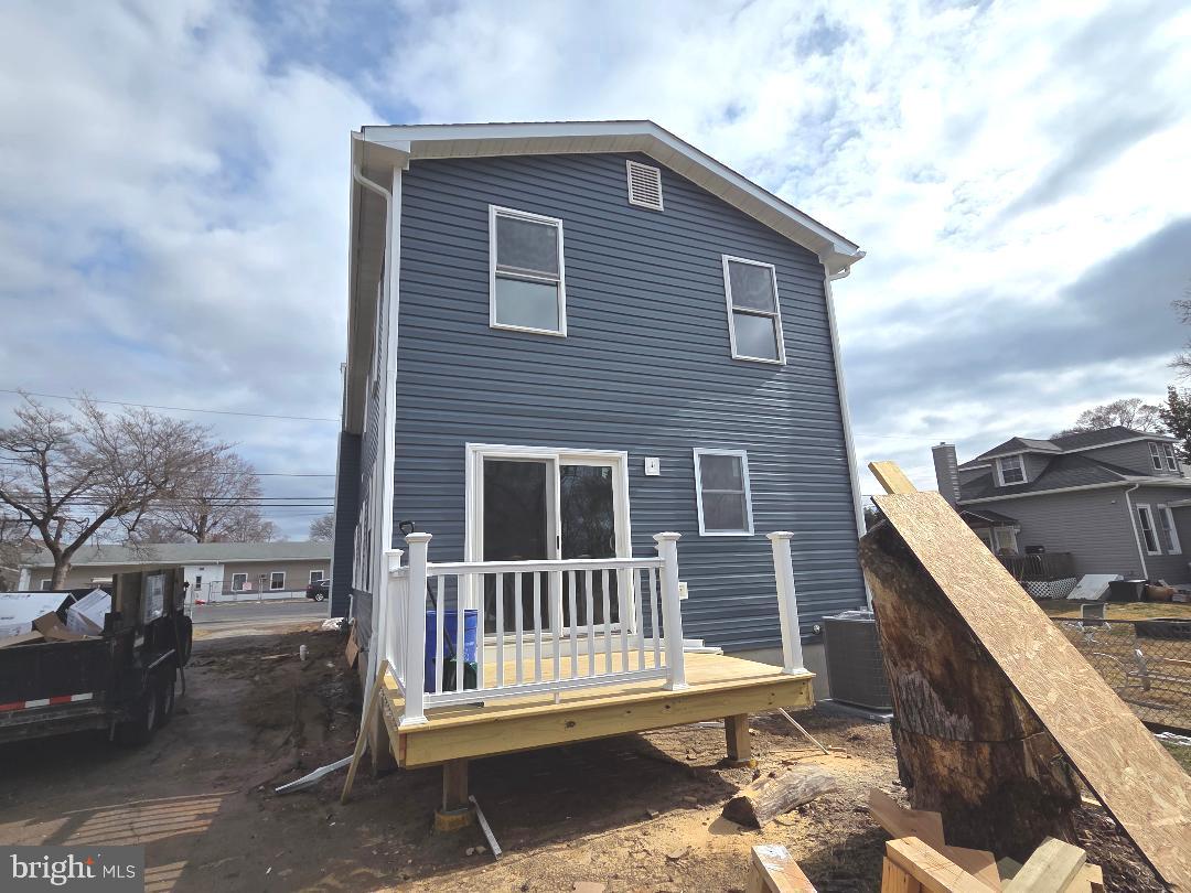 730 Excelsior Avenue Croydon, PA 19021 - Photo 10 of 10 a brick house with a large window and wooden fence