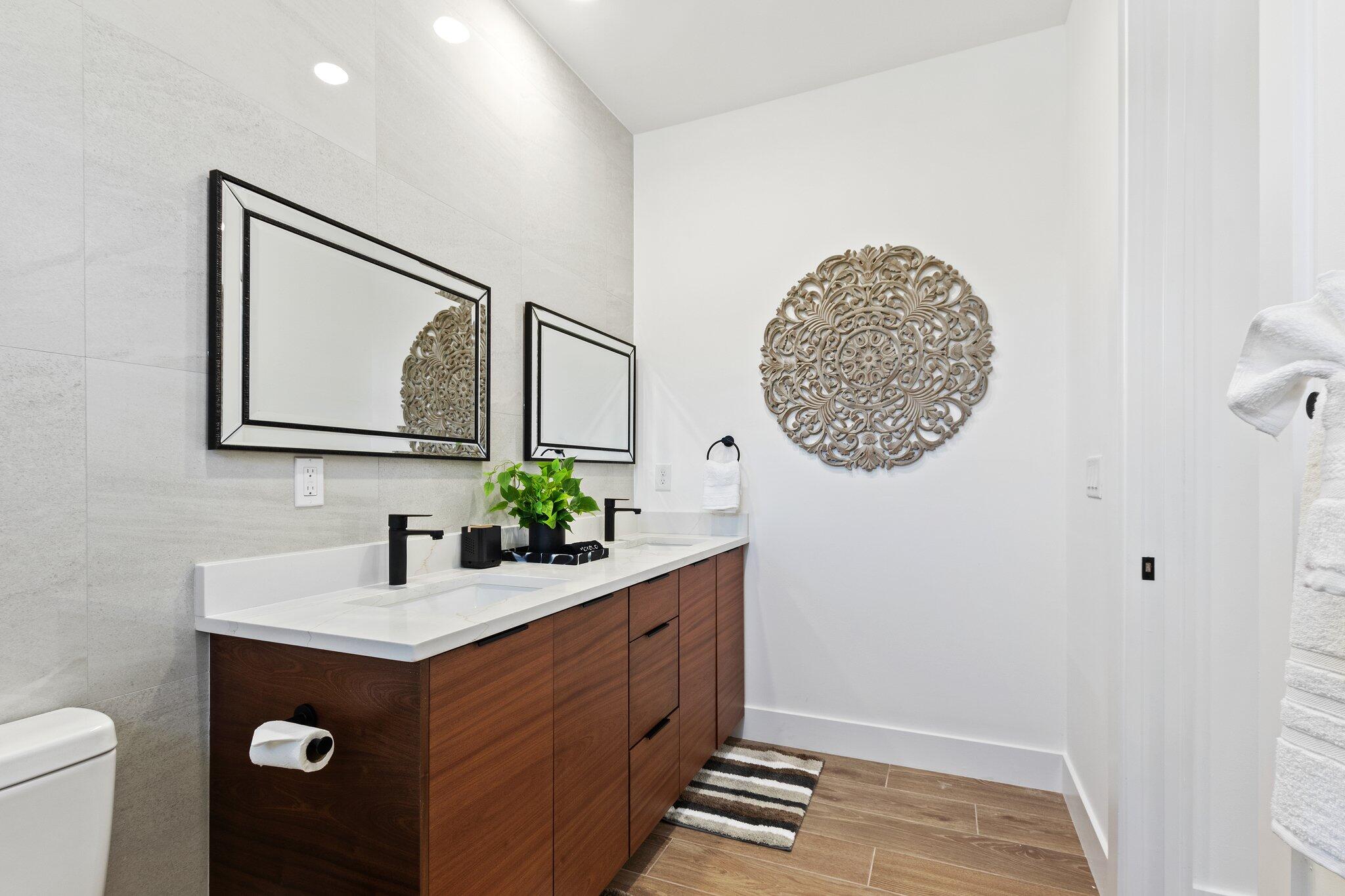 601 Southwest 3rd Street Delray Beach, FL 33444 - Photo 40 of 75 a bathroom with a double vanity sink and a mirror