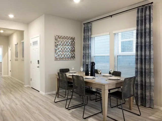 a kitchen with appliances a sink cabinets and a counter top space