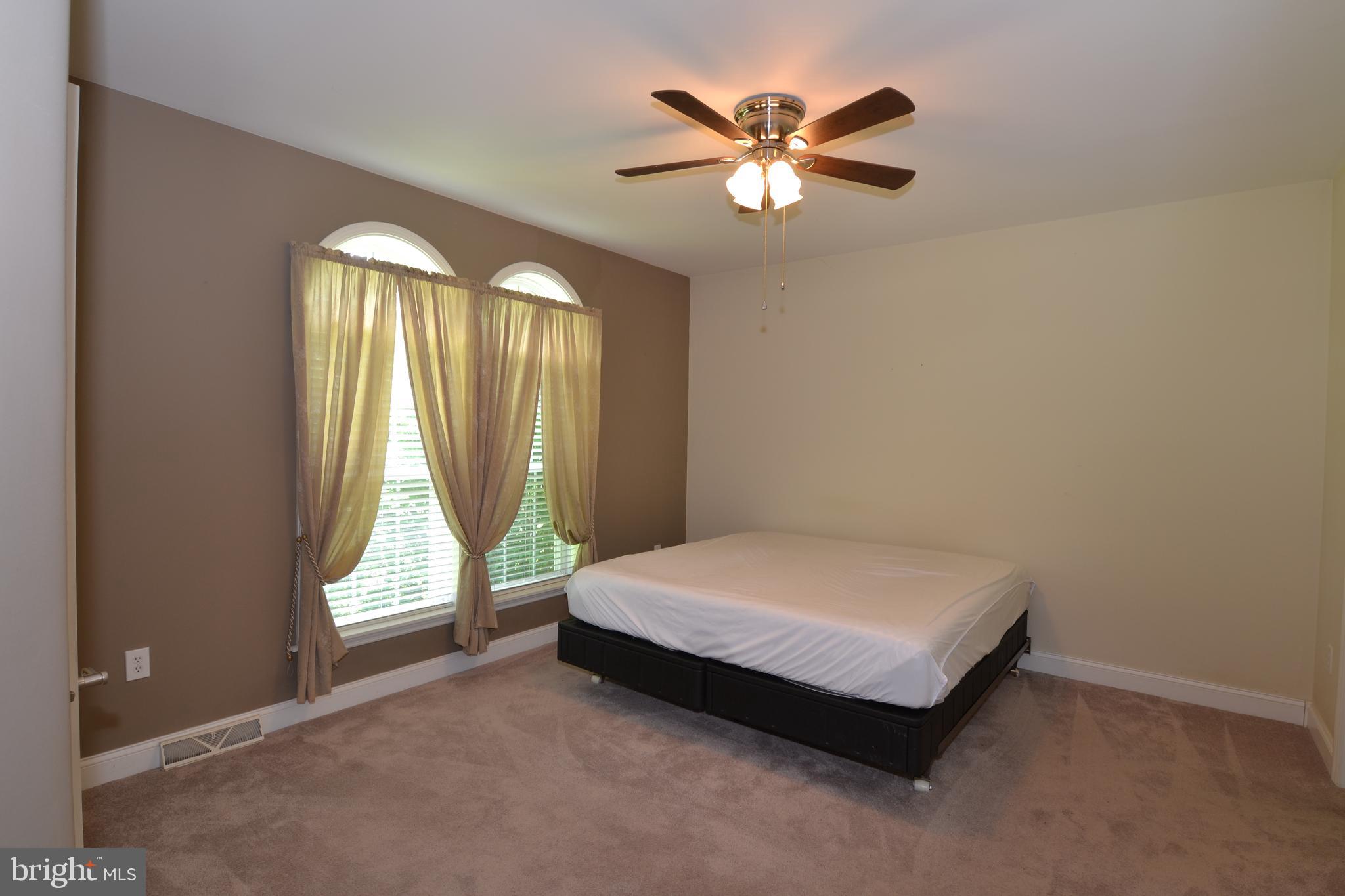 2061 Limestone Road Cochranville, PA 19330 - Photo 16 of 35 Main bedroom with ceiling fan