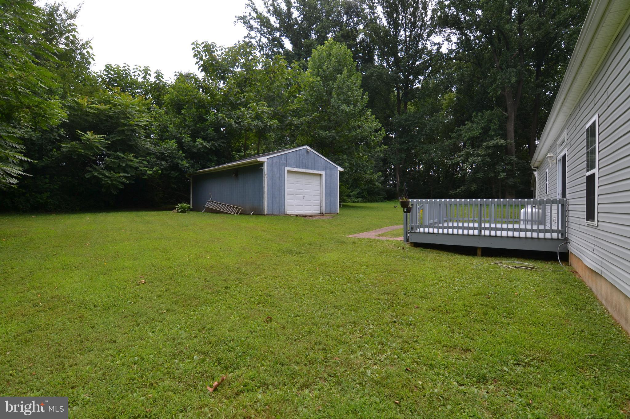 2061 Limestone Road Cochranville, PA 19330 - Photo 27 of 35 Back yard deck and garage shed
