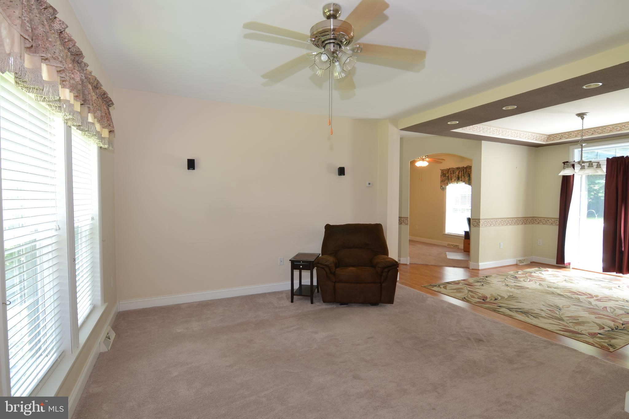 2061 Limestone Road Cochranville, PA 19330 - Photo 5 of 35 Living room with ceiling fan