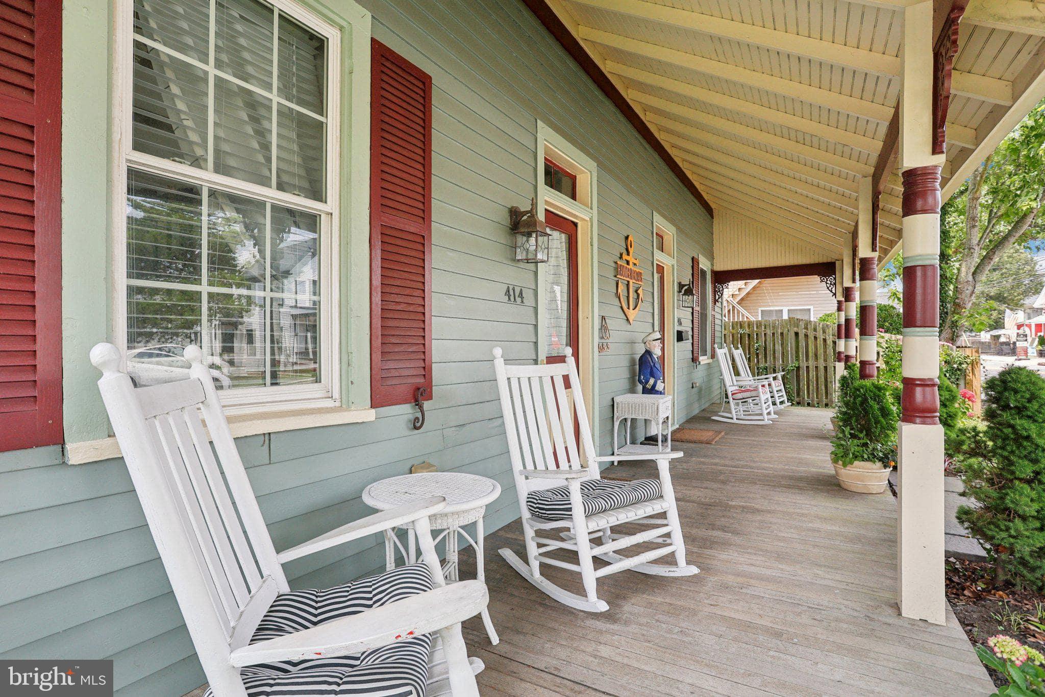 416 Broadway Cape May, NJ 08204 - Photo 22 of 49 a view of a chairs with a table and chairs