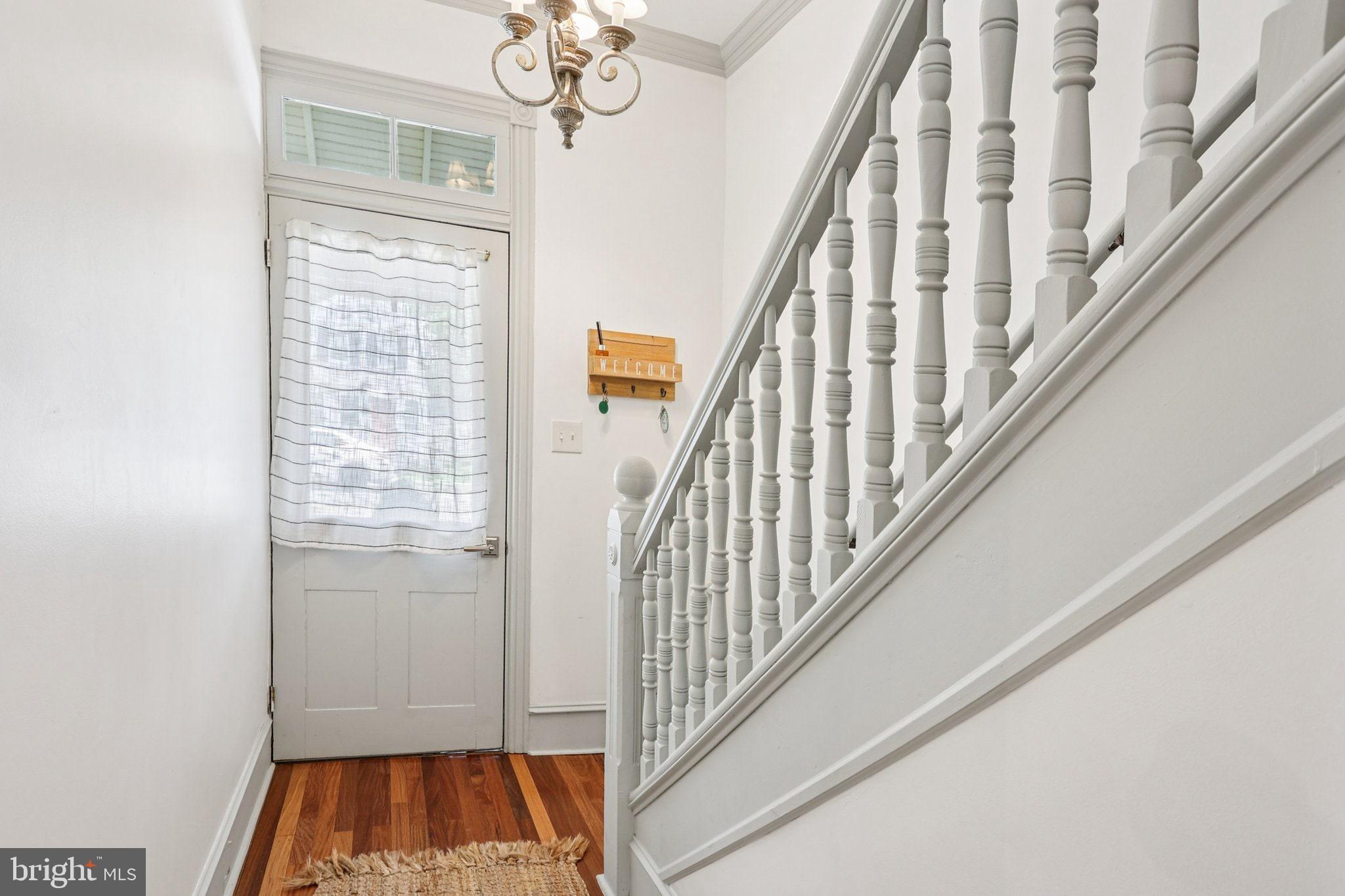 416 Broadway Cape May, NJ 08204 - Photo 25 of 49 a view of an entryway with wooden floor