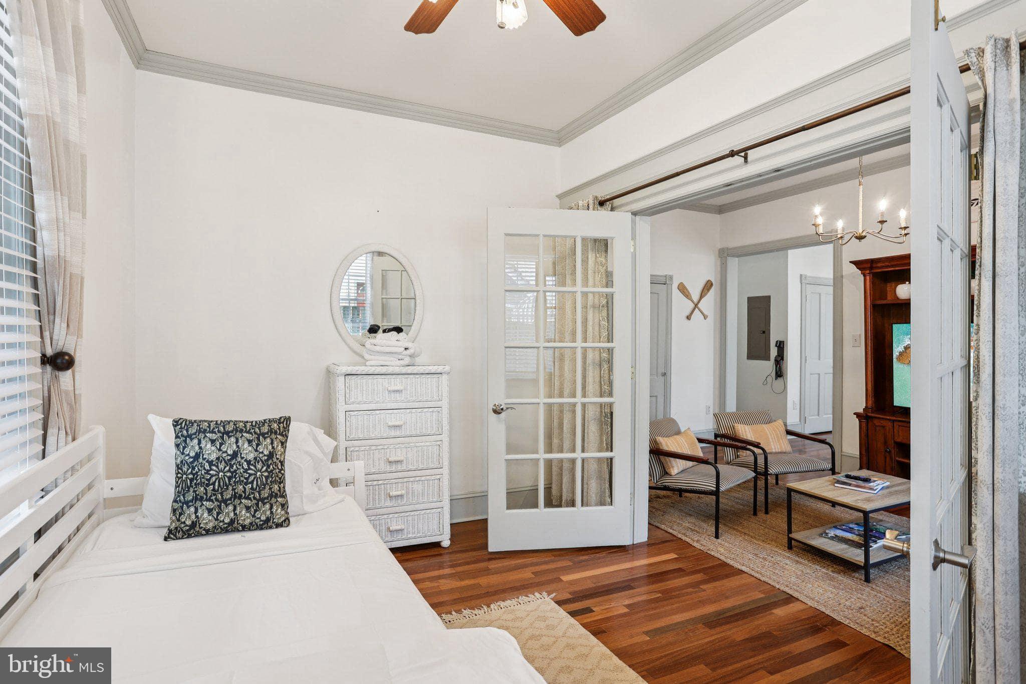 416 Broadway Cape May, NJ 08204 - Photo 30 of 49 a living room with furniture and a rug