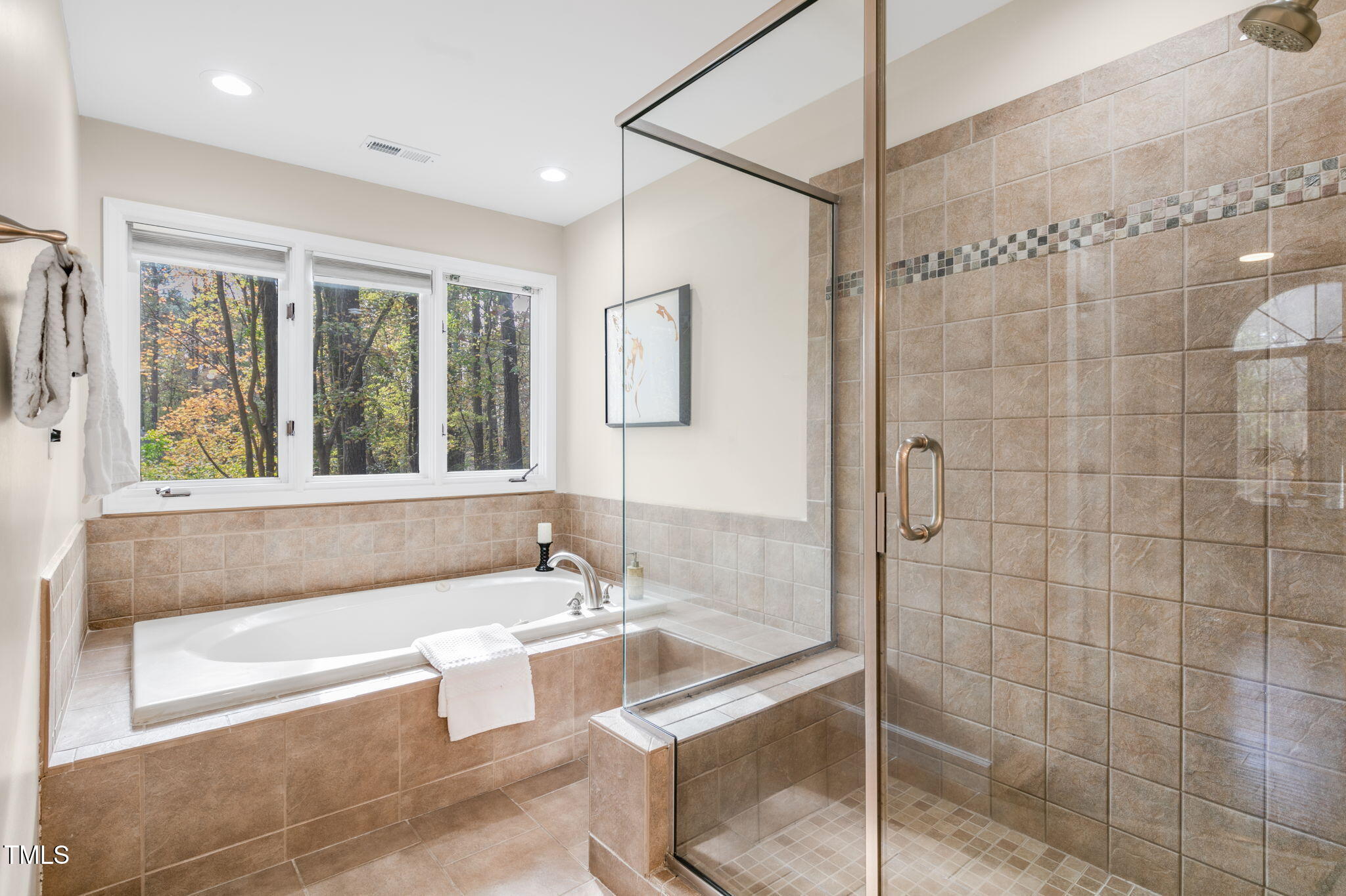 6205 Trevor Court Raleigh, NC 27613 - Photo 32 of 42 Master bath and shower