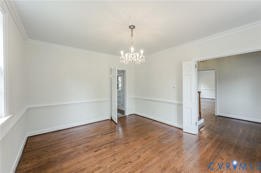 401 Caroline Street Ashland, VA 23005 - Photo 12 of 63 wooden floor in an empty room with a window
