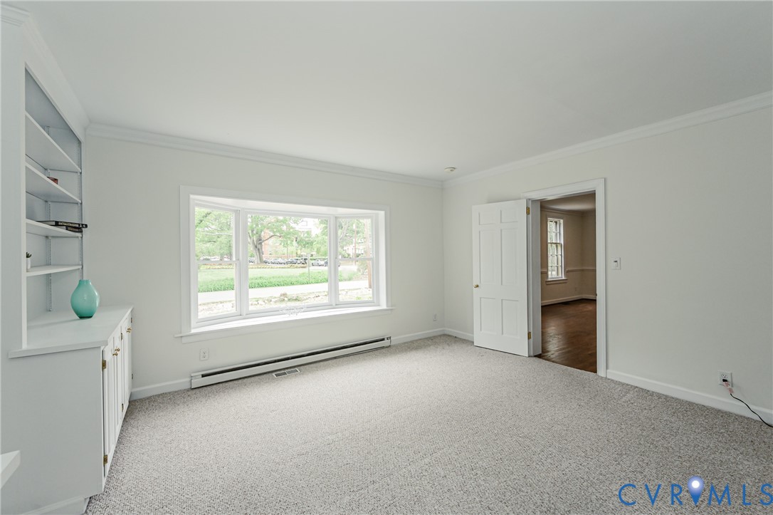401 Caroline Street Ashland, VA 23005 - Photo 27 of 63 an empty room with a window