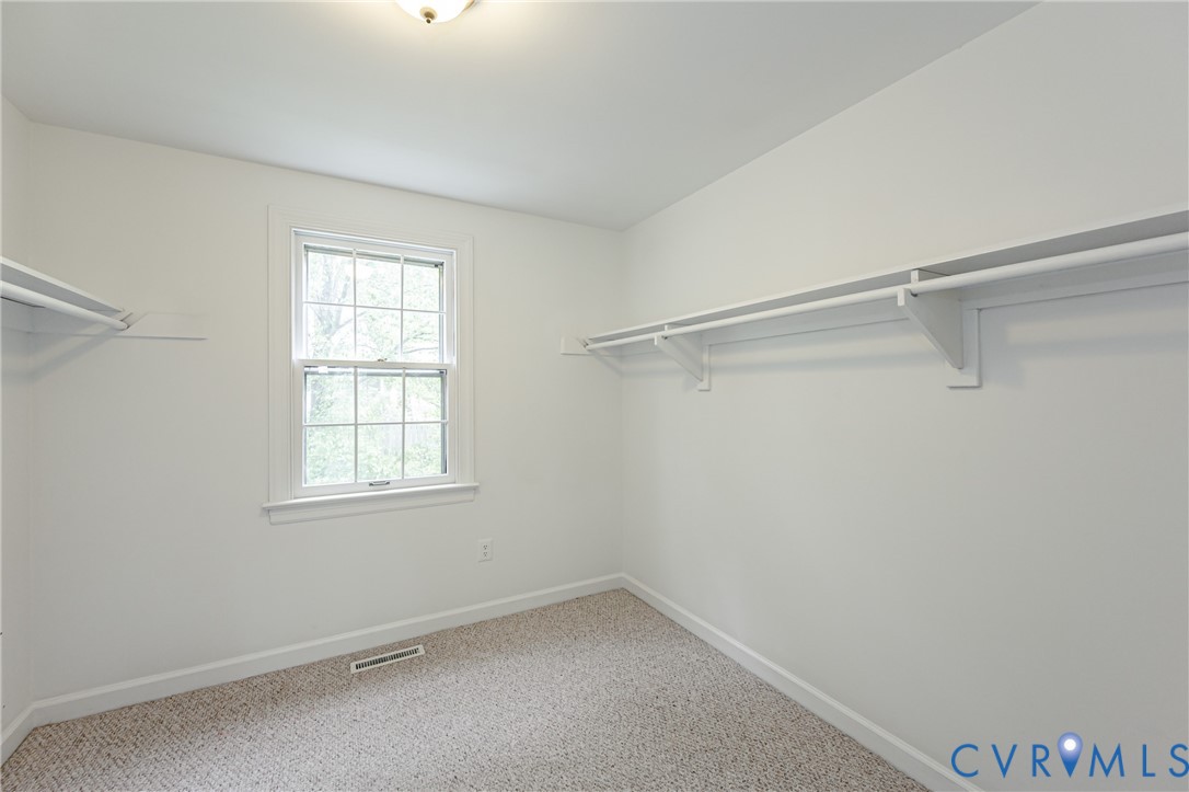401 Caroline Street Ashland, VA 23005 - Photo 32 of 63 an empty room with a window